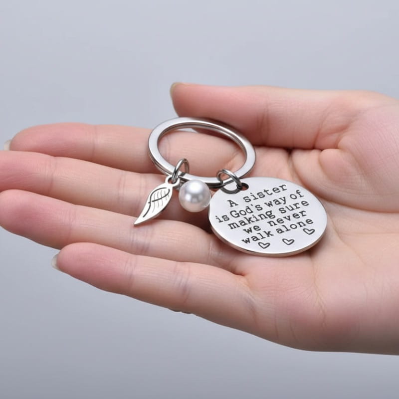 A Sister is God's Way of Making Sure We Never Walk Alone Keychain